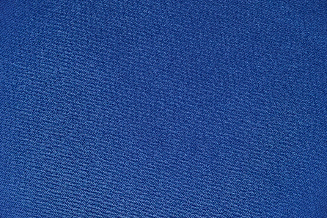 blue textile in close up photography