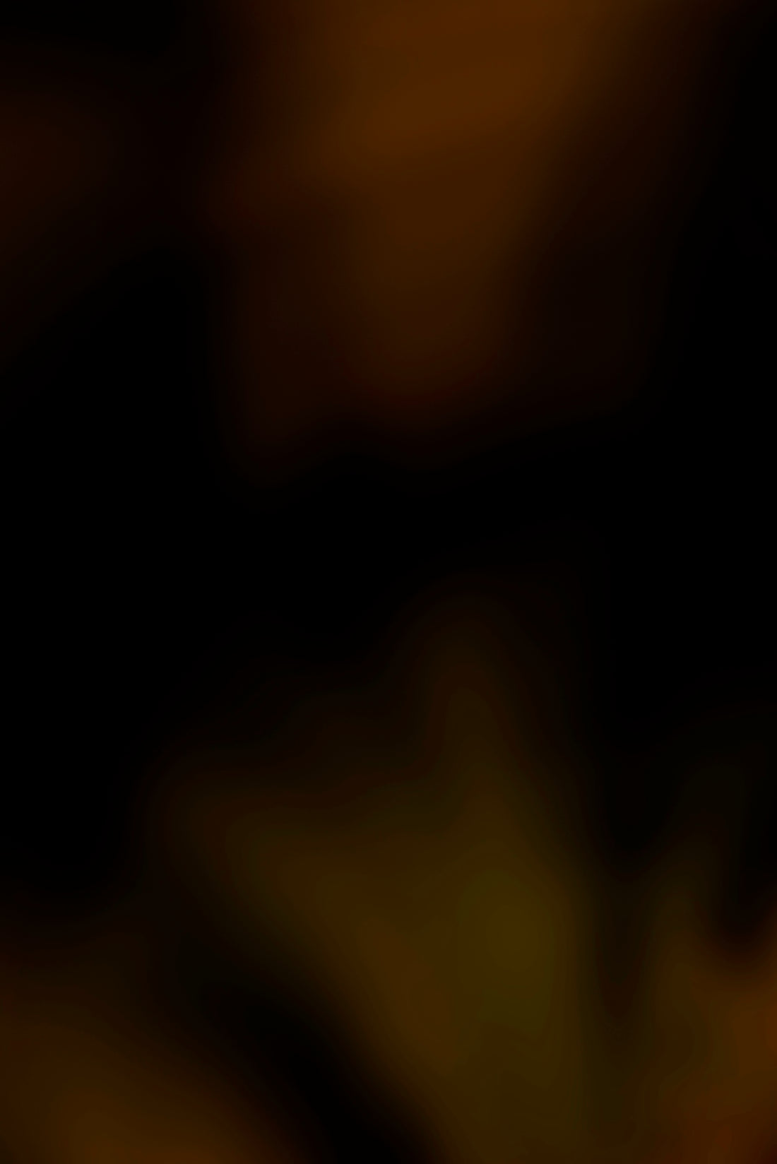 a blurry photo of a banana on a plate