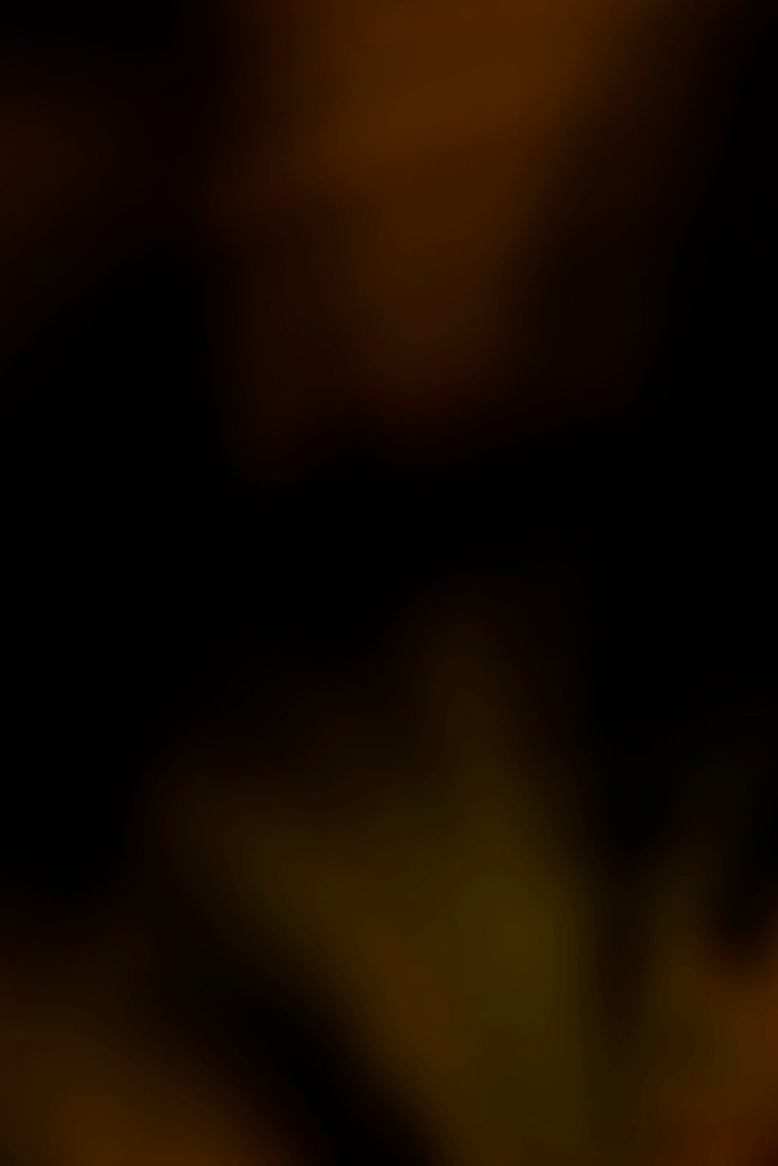 a blurry photo of a banana on a plate