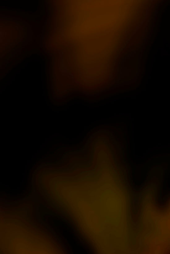 a blurry photo of a banana on a plate