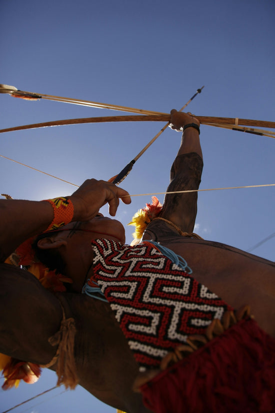 a person holding a stick