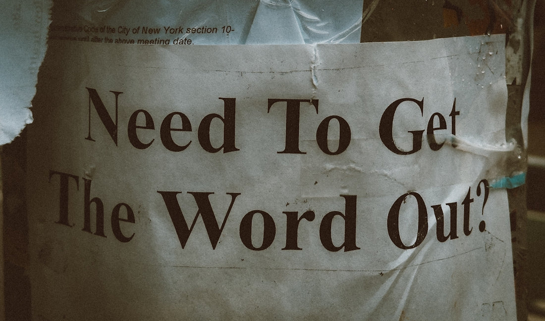 a sign that says need to get the word out