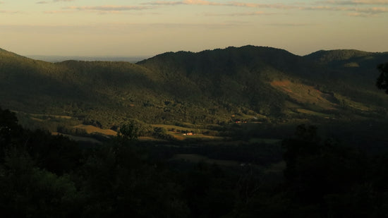 a view of a mountain range from a distance