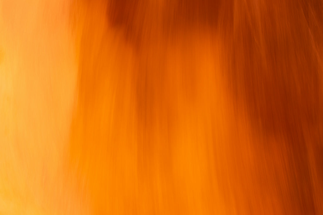 A blurry photo of a blurry orange background