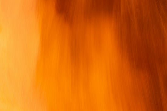A blurry photo of a blurry orange background