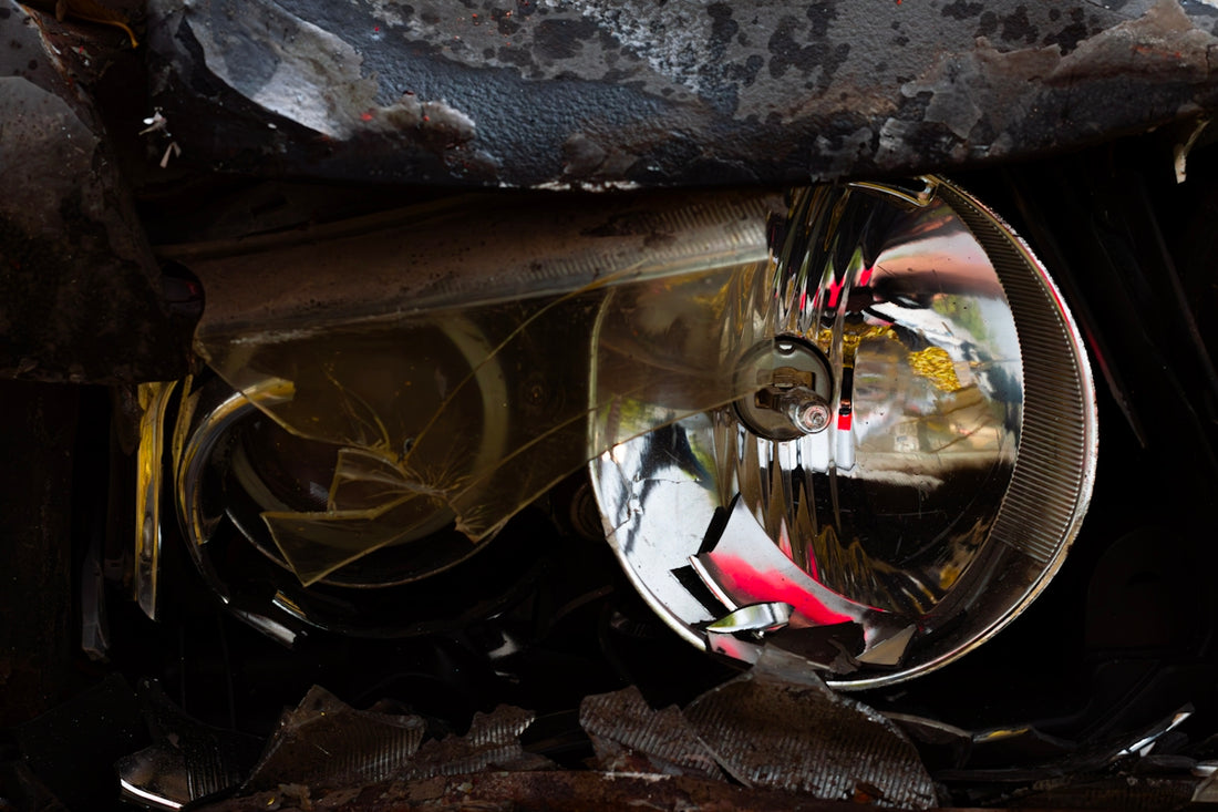 A close up of a broken down car