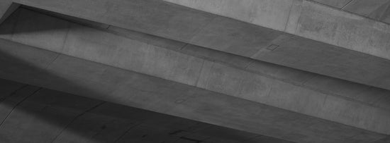 A black and white photo of a person on a skateboard
