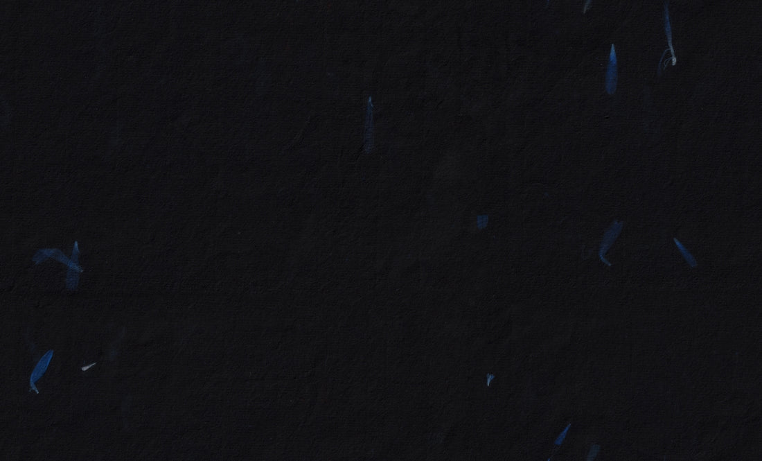 Blue streaks against a dark background