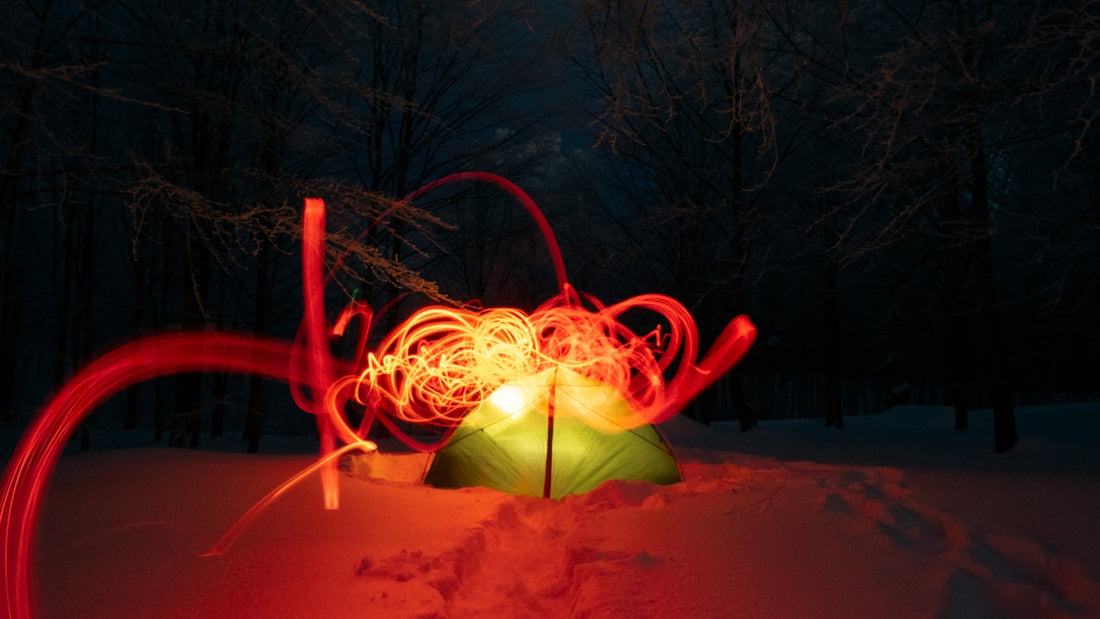 A red and green object in the snow