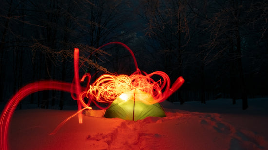 A red and green object in the snow