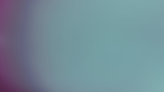 Blurred background transitions from purple to blue.