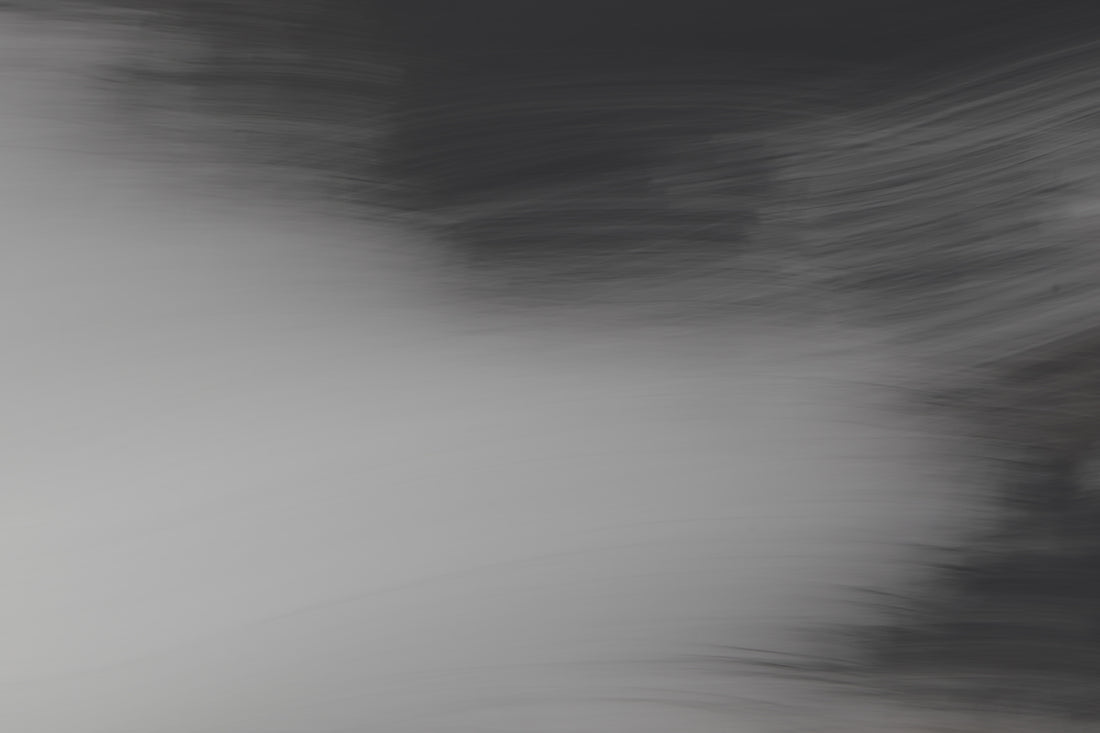 Abstract light and dark gray smoky texture