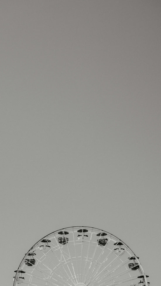 A ferris wheel against a clear sky